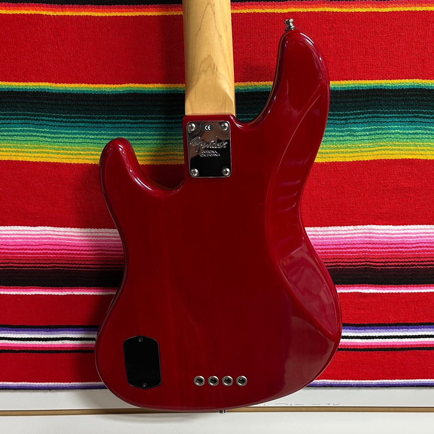 Fender American Deluxe Jazz Bass Fretless Crimson Red Transparent (1999)