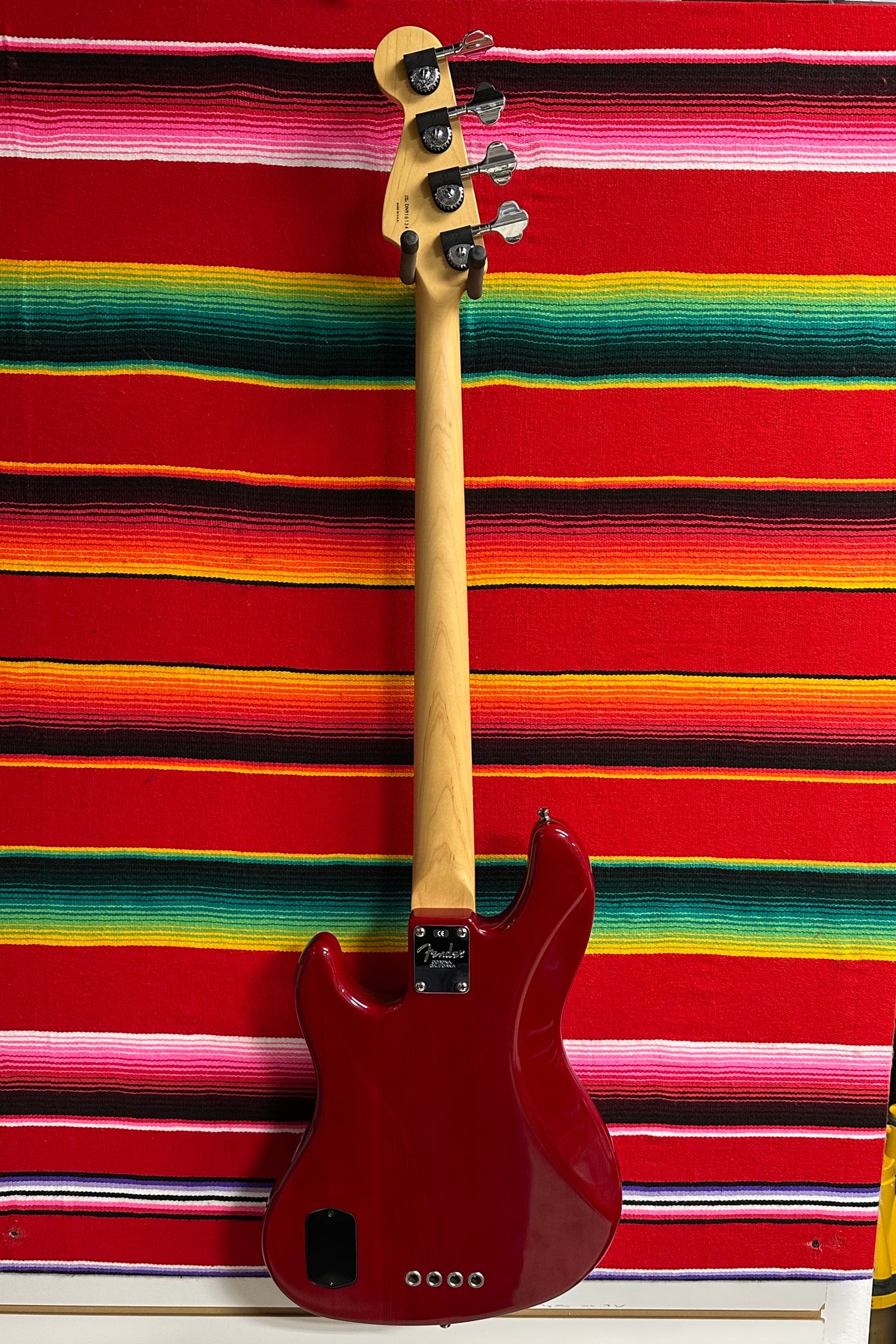Fender American Deluxe Jazz Bass Fretless Crimson Red Transparent (1999)