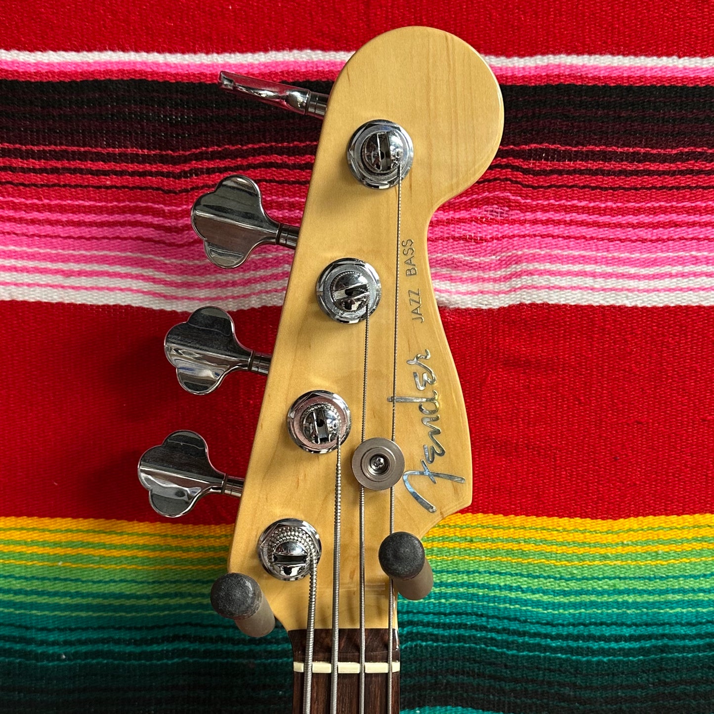 Fender American Deluxe Jazz Bass Fretless Crimson Red Transparent (1999)